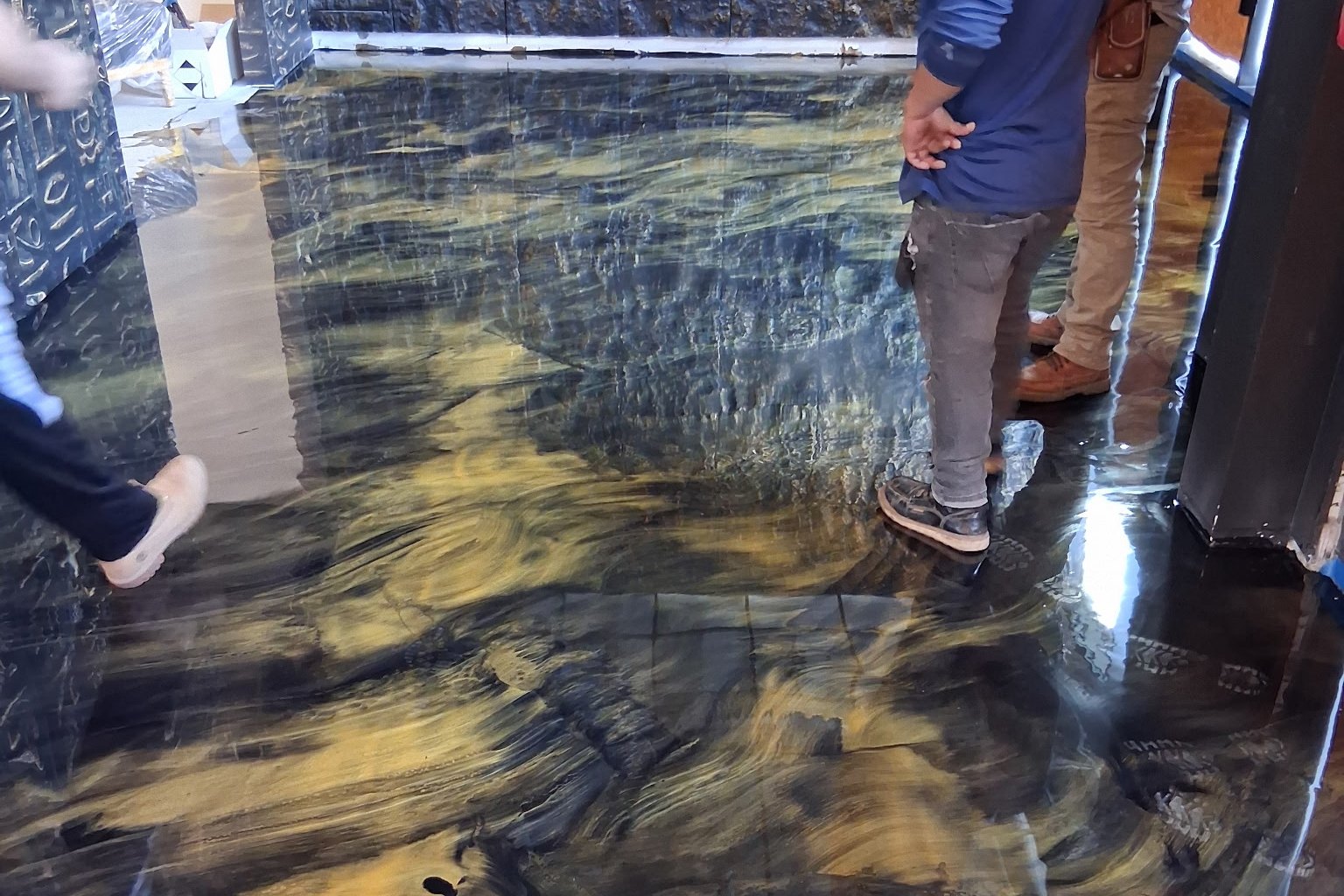 Gold and black metallic floor in a commercial space